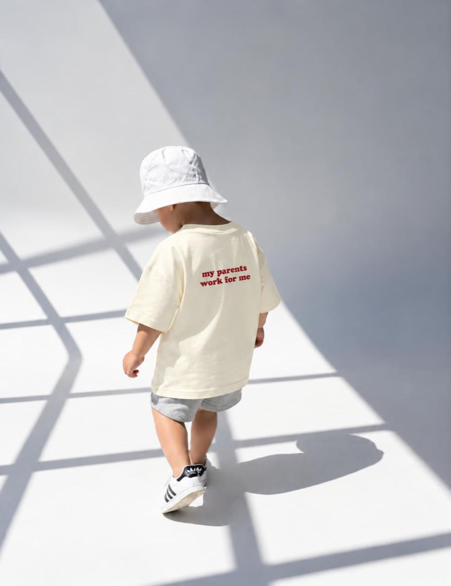 Child wearing a Mini Boss T-shirt