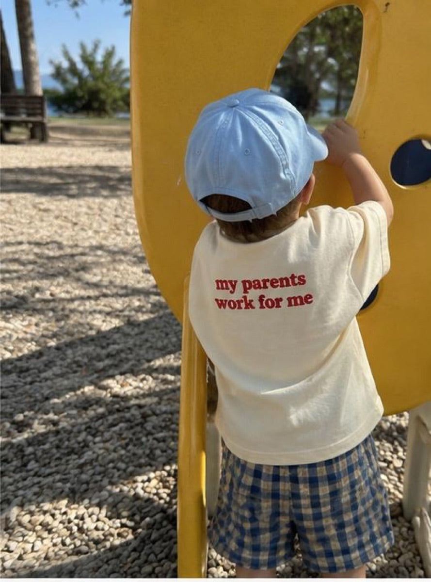 Child wearing a Mini Boss T-shirt